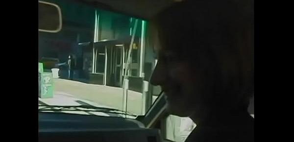  Redhead chick gets excited when two old dudes drive her around the city and at the same time hang clothespins on her nipples